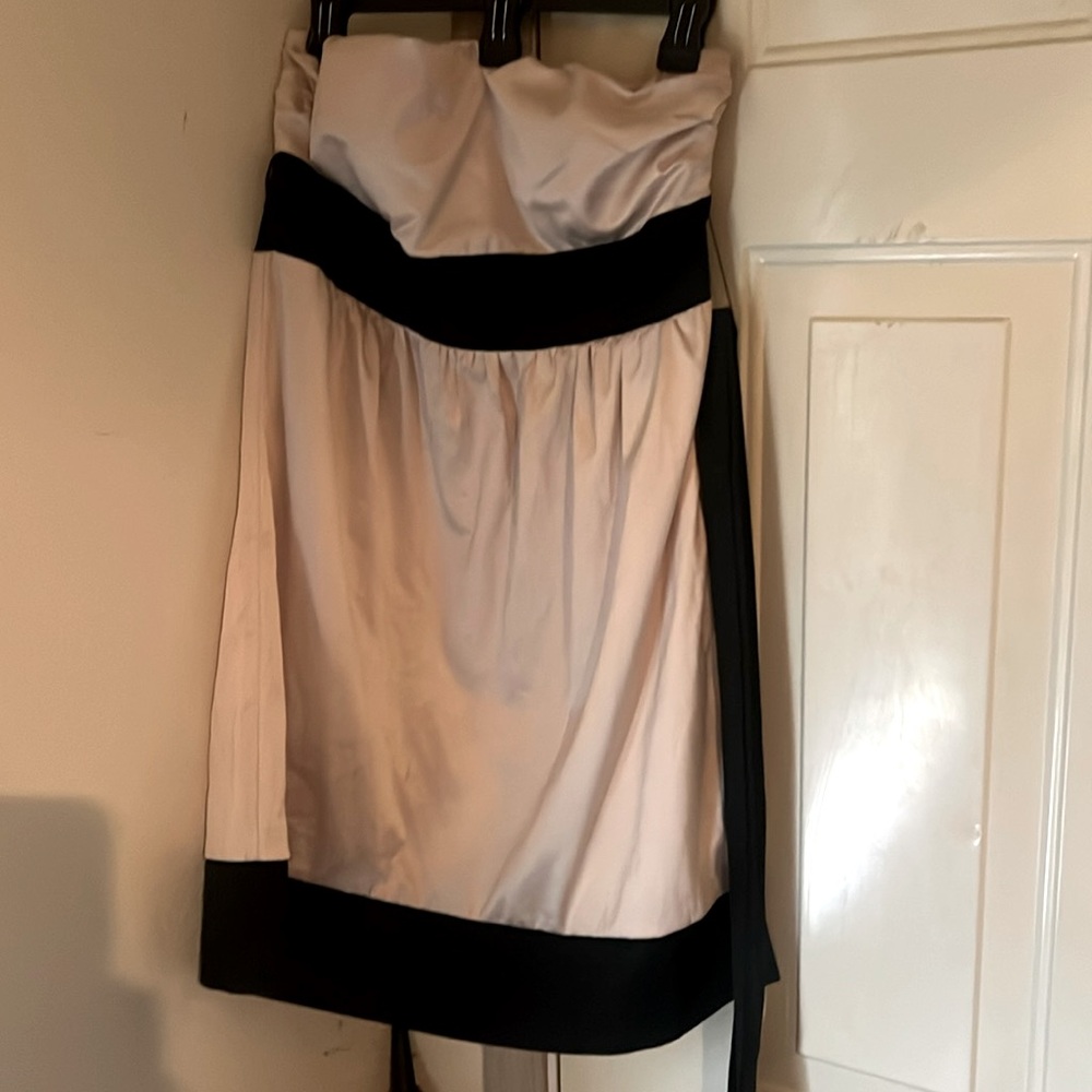 Size L Strapless perfect for a wedding or date or black snd cream classy event